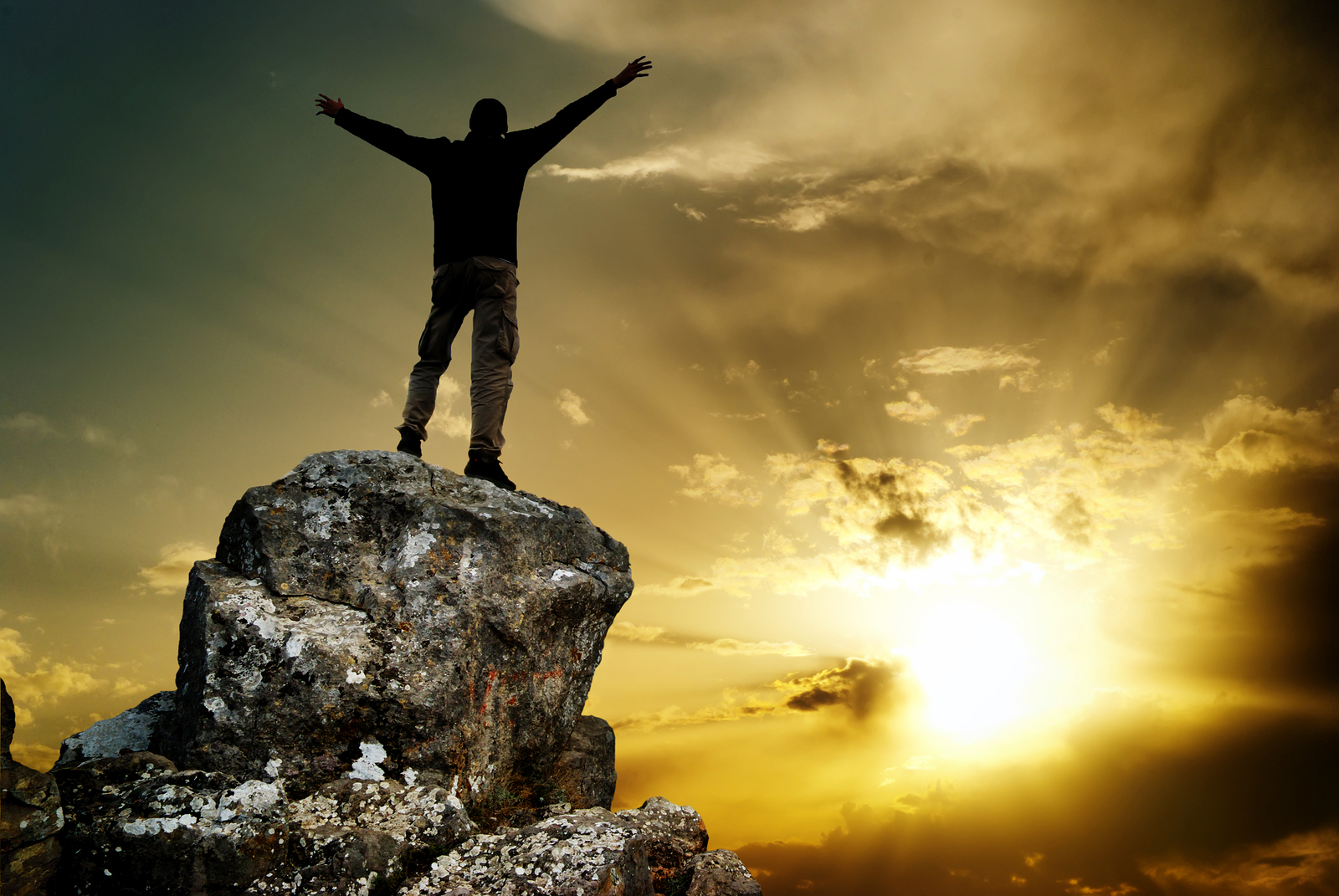 bigstock-Man-on-top-of-mountain-Concep-47176237